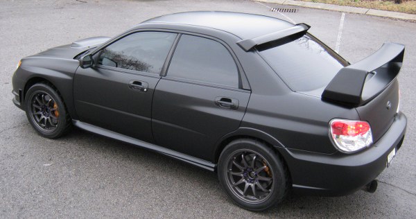 custom matte black car wrap on  STi