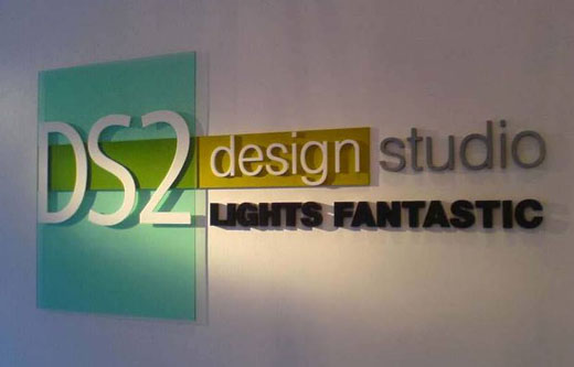 Dimensional letters and acrylic panel in custom office lobby sign