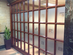 Etched glass vinyl with logo for conference room privacy