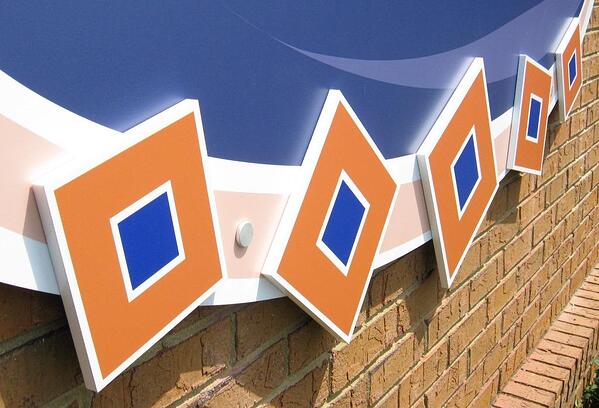 Dimensional features of outdoor logo sign