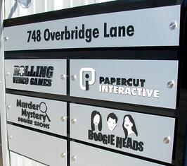 Exterior business directory sign with custom dimensional tenant logos