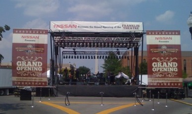 Large concert banners designed by Birdsong Creative, printed and installed by 12-Point SignWorks