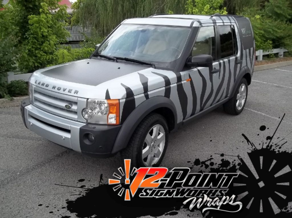 Land Rover LR3 custom zebra wrap with matte black vinyl