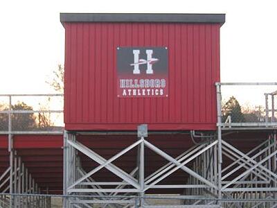 Athletic field press box logo sign