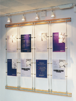 sign panels suspended by architectural rod display system