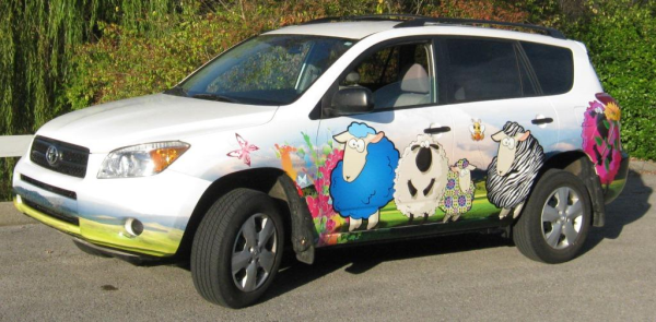 Custom vinyl car wrap design with cartoon sheep design