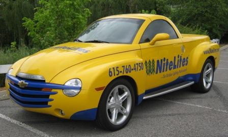 We installed some vinyl graphics and partial blue wrap to this Chevy SSR. This is sure to stand out!