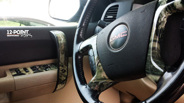 Rich adds camo wrap to the interior of his GMC Sierra.