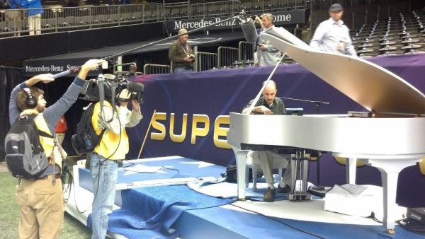 Seale Keyworks tuning the Super Bowl piano on site