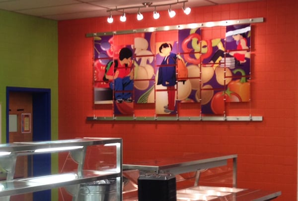 A wall mural architectural display hanging in Paige Middle School in Williamson County. 12-Point SignWorks