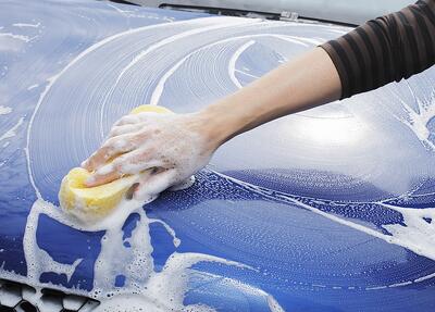 Hand washing a car. 12-Point SignWorks
