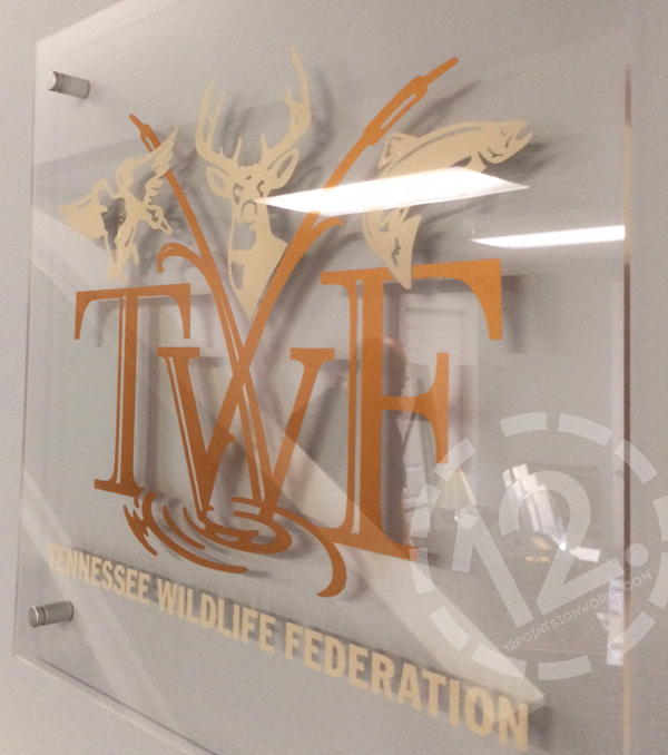 The 18" by 18" clear acrylic sign for the lobby of TWF in Nashville, TN. 12-Point SignWorks