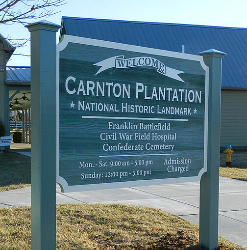 The sandblasted redwood post and panel sign of the Carnton Plantation. 12-Point SignWorks