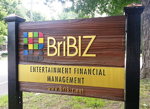 Sandblasted wood sign for BriBiz Entertainment Financial Management. 12-Point SignWorks