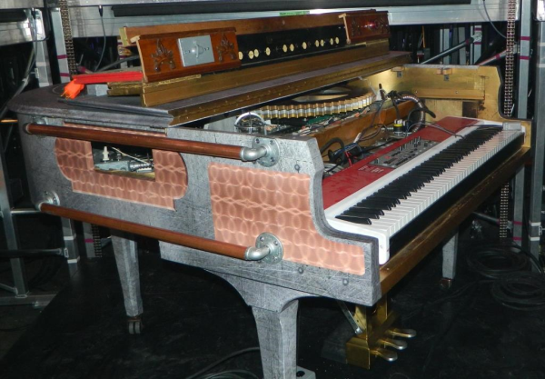 Steampunk piano for touring musician by 12-Point SignWorks