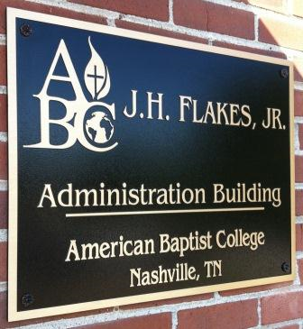 Bronze plaque for administrative building at American Baptist College. 12-Point SignWorks