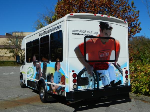 Rear view of the ABLE Youth Bus Wrap