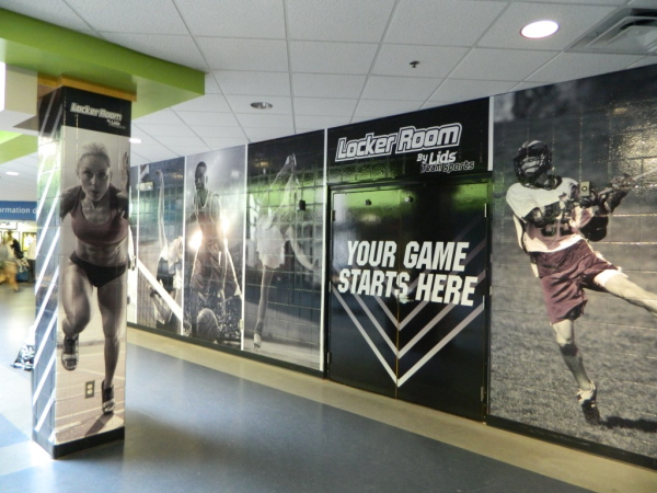 Vinyl wall mural for LIDS retail location in the Franklin, TN A-Game sports facility by 12-Point SignWorks