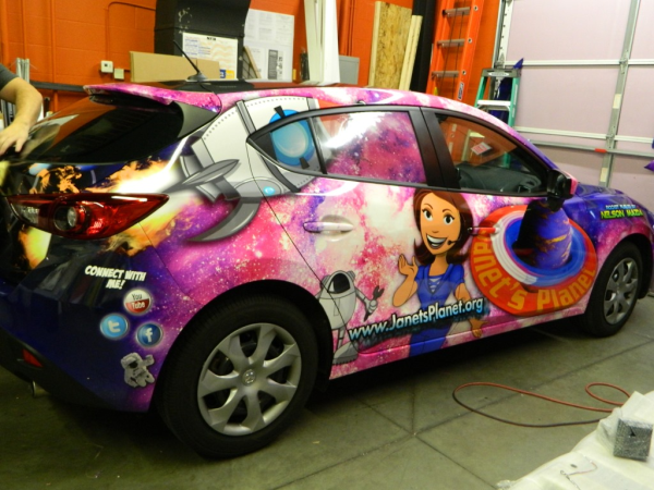 Advertising wrap for Janet's Planet, design and installation by 12-Point SignWorks