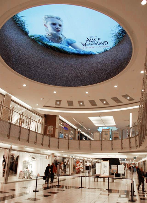 Ambient ceiling mural in Rome advertising the release date of "Alice in Wonderland" by Disney