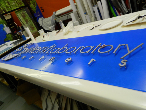 Brushed aluminum letters for the Merit Laboratory Partners sign