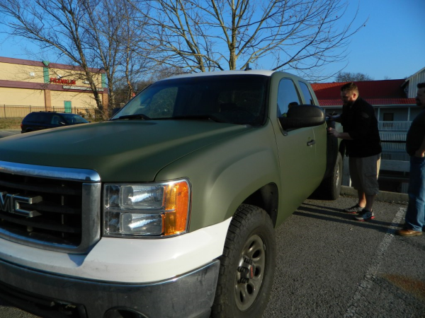 Matte military green truck wrap for 12-Point SignWorks employee Rich Novia