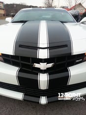 Black satin stripes installed on a white Camaro by 12-Point SignWorks.