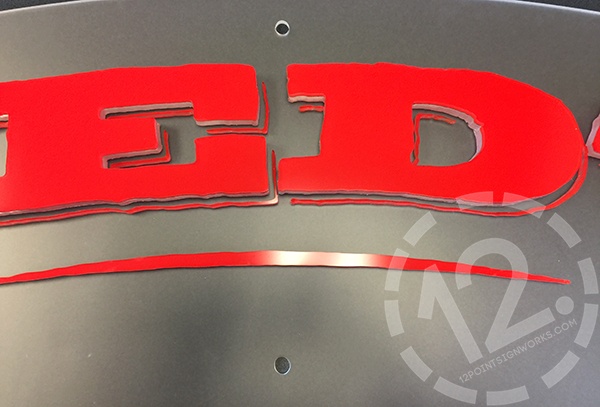 A close-up of the 'E' and 'D' of the Red's logo sign. 12-Point SignWorks - Franklin TN