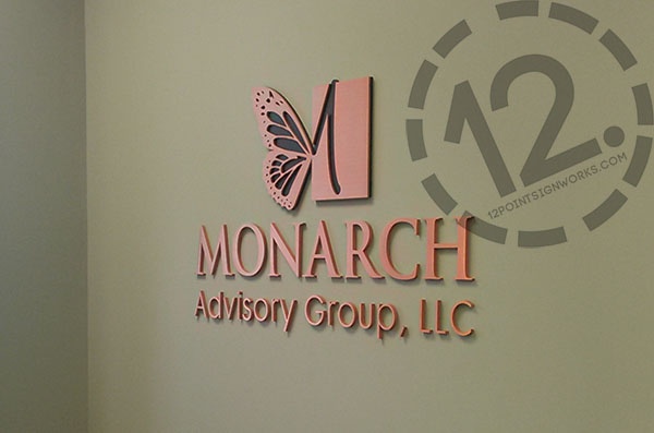 The brushed and oxidized copper logo sign for Monarch Advisory Group in Franklin TN. 12-Point SignWorks - Franklin TN