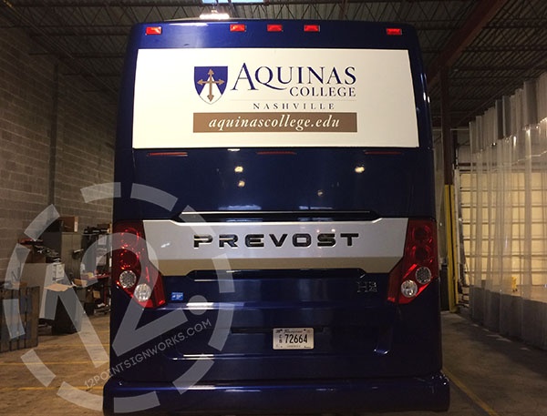 Aquinas College rented Prevost bus with temporary graphics. 12-Point SignWorks - Franklin TN
