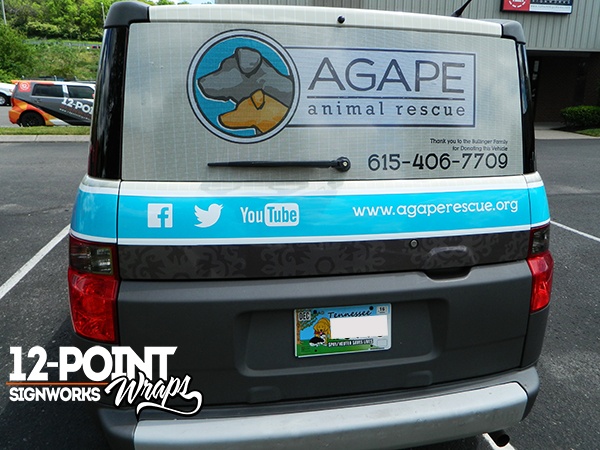 2004 Honda Element custom advertising wrap with perforated window vinyl for Agape Animal Rescue. 12-Point SignWorks - Franklin, TN