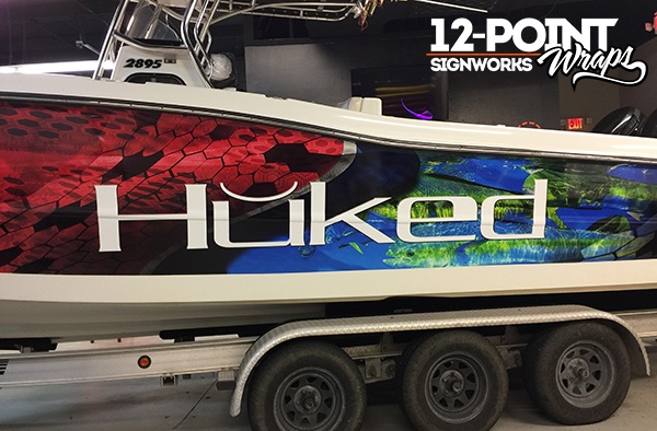 A close-up of the wrap design for the Triton 2895 CC. 12-Point SignWorks - Franklin TN