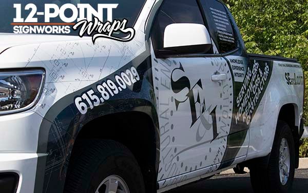 A close-up of the driver's side of the SE&I 2017 Chevy Colorado partial advertising wrap. 12-Point SignWorks - Franklin TN