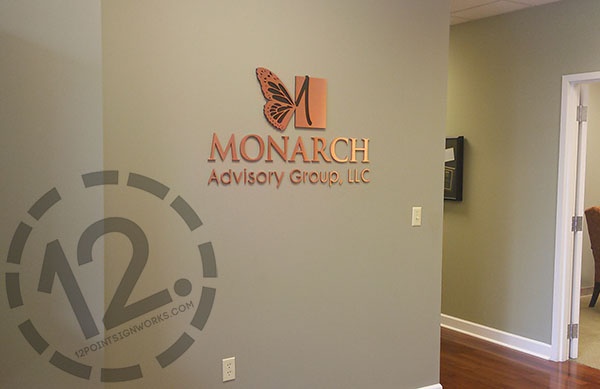 The brushed and oxidized copper logo sign for Monarch Advisory Group in Franklin TN. 12-Point SignWorks - Franklin TN