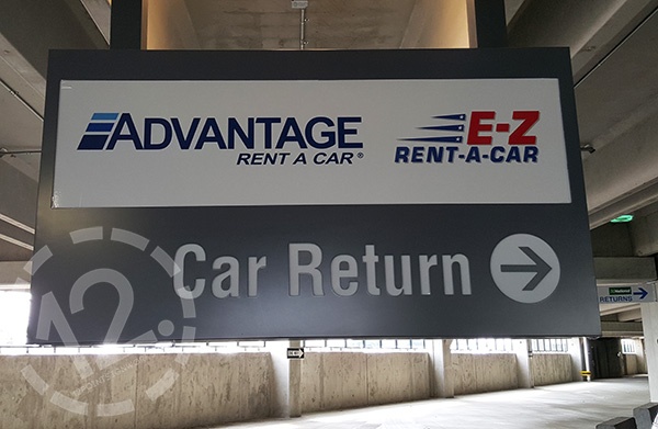 A hanging sign for Advantage Rent A Car at the Nashville Airport. 12-Point SignWorks - Franklin, TN