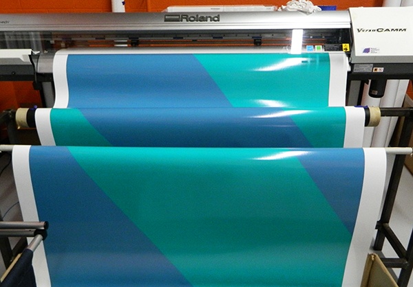 The digital print coming off of our printer at our 12-Point SignWorks shop. Franklin, TN