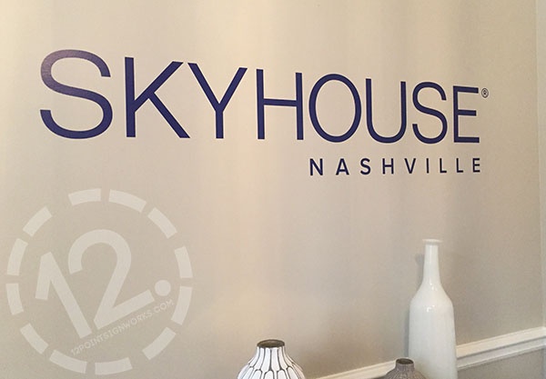 Custom SkyHouse logo graphic inside the pre-leasing office in Nashville. 12-Point SignWorks - Franklin TN