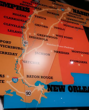 Close-up of die cut map and triangle overlay for the AMT project at the Franklin Visitors Center. 12-Point SignWorks