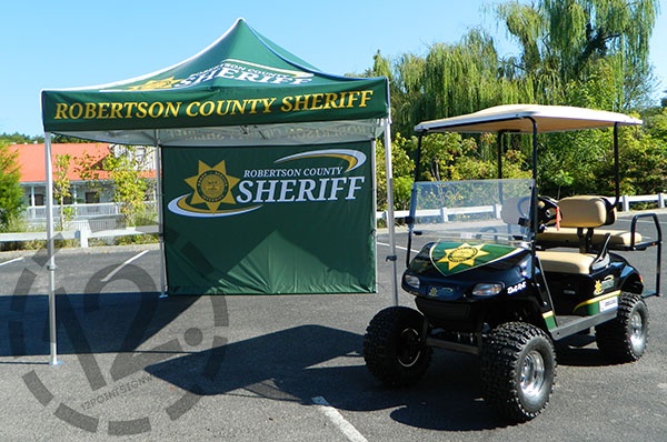 Completed pop-up tent and E-Z-GO golf cart for the Robertson County Sheriff's Office. 12-Point SignWorks - Franklin, TN