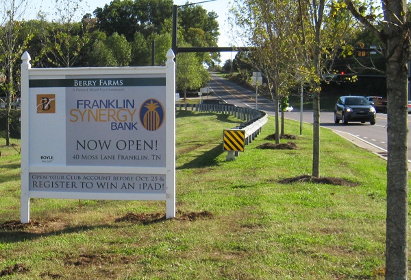 Post and panel signage on the road for Franklin Synergy Bank's Berry Farms location. 12-Point SignWorks
