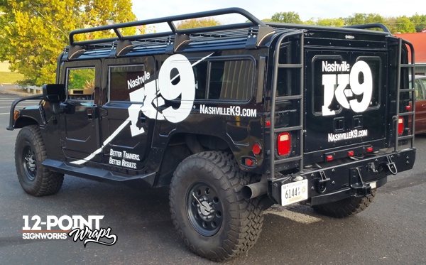 A view of the side and rear of the Hummer H1 for Nashville K-9. 12-Point SignWorks