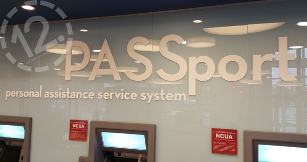 Dimensional acrylic letters on a backpainted glass wall at the Ascend FCU Murfreesboro location. 12-Point SignWorks