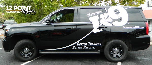 The side view of the completed 2015 Chevy Tahoe with custom vinyl graphics for Nashville K-9. 12-Point SignWorks