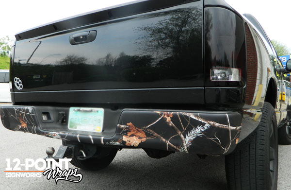 Camo vinyl wrap on a Dodge RAM bumber by 12-Point SignWorks in Franklin, TN.
