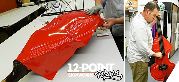 The wrapped bass for Kelly Clarkson's Christmas special. 12-Point SignWorks