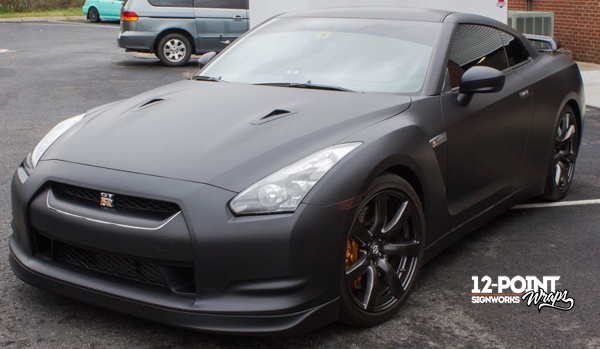 Completed custom matte black wrap on a 2010 Nissan GT-R by 12-Point SignWorks in Franklin, TN.
