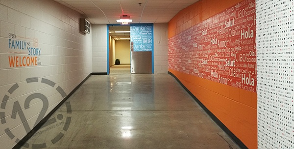 Environmental graphics for Loews Vanderbilt in Nashville, TN - hello wall and thank you door. 12-Point SignWorks