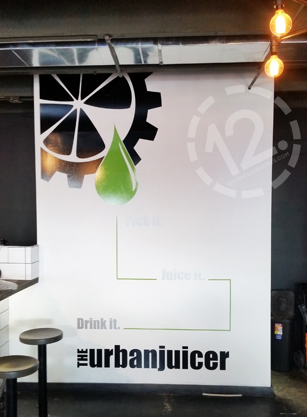 The installed graphics on the wall at The Urban Juicer in East Nashville. 12-Point SignWorks