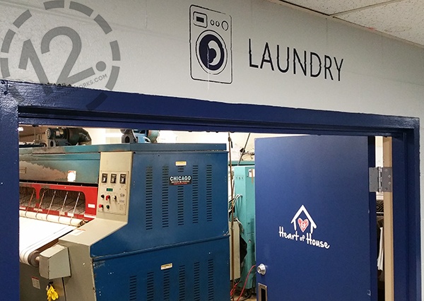 Environmental graphics for Loews Vanderbilt in Nashville, TN - laundry. 12-Point SignWorks