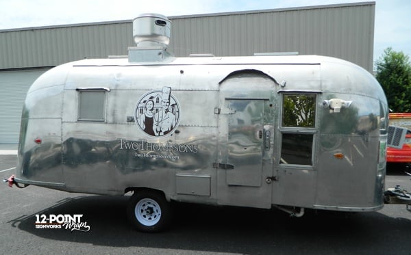 The other side of the Airstream trailer with the installed Two Thompsons graphics. 12-Point SignWorks